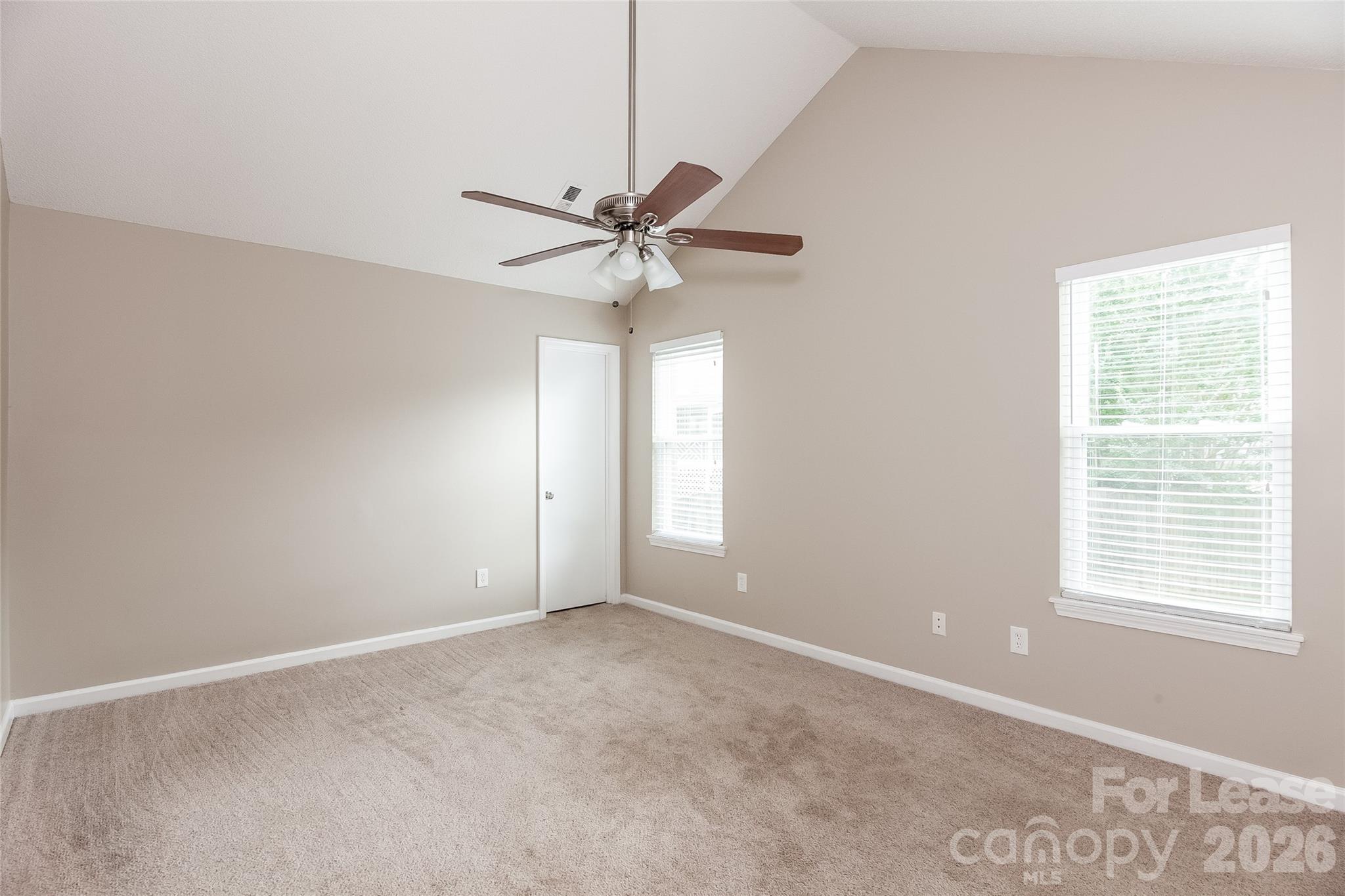 8625 Flowers Court Charlotte, NC 28215 - Photo 7 of 16 a view of an empty room with a window