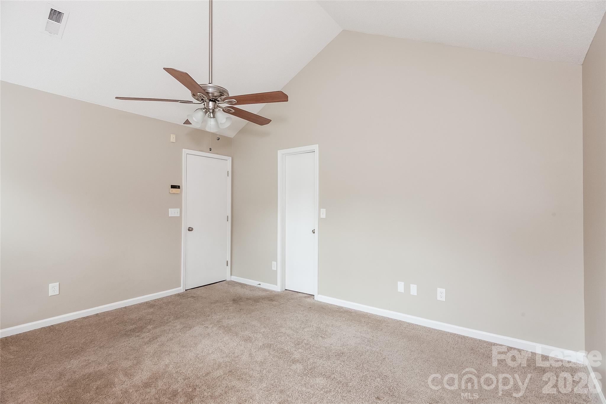 8625 Flowers Court Charlotte, NC 28215 - Photo 8 of 16 a view of a ceiling fan with a ceiling fan