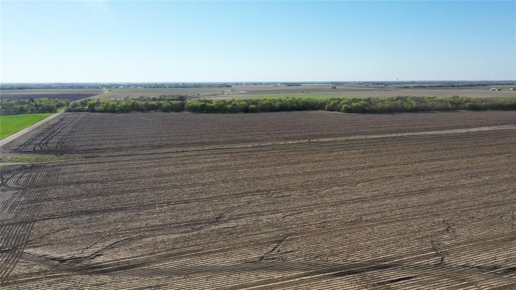 Tbd North Cemetery Road Collinsville, TX 76233 - Photo 13 of 26 wooden floor with a lake view