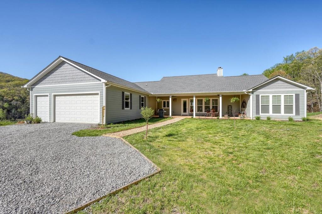 1735 Downings Creek Road Hayesville, NC 28904 - Photo 1 of 42 a view of outdoor space yard and front view of a house