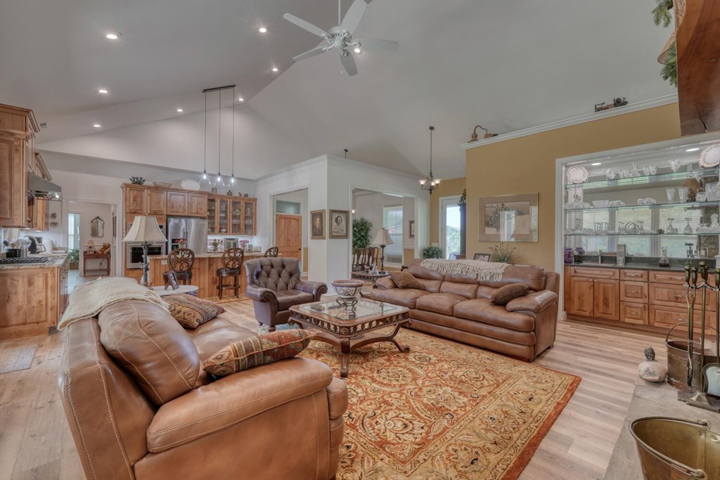 1735 Downings Creek Road Hayesville, NC 28904 - Photo 6 of 42 a living room with furniture and a large window
