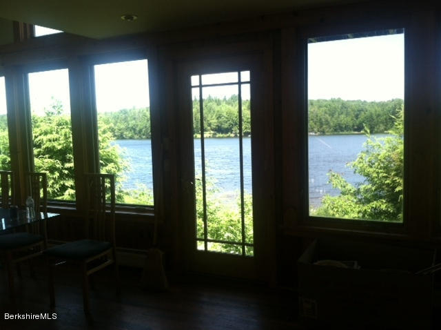 84 Windsor Pond Road Windsor, MA 01270 - Photo 11 of 46 a view of an empty room with a window