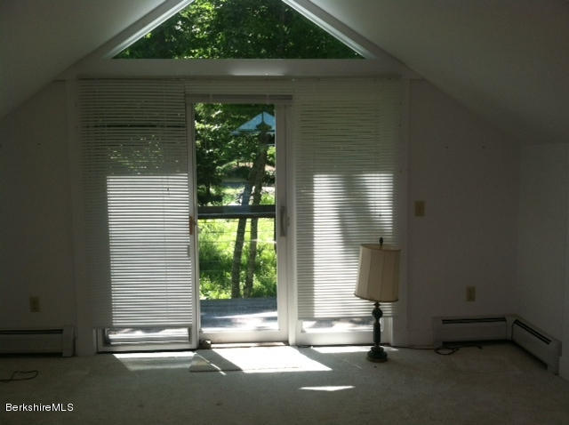 84 Windsor Pond Road Windsor, MA 01270 - Photo 23 of 46 a view of a house with a porch