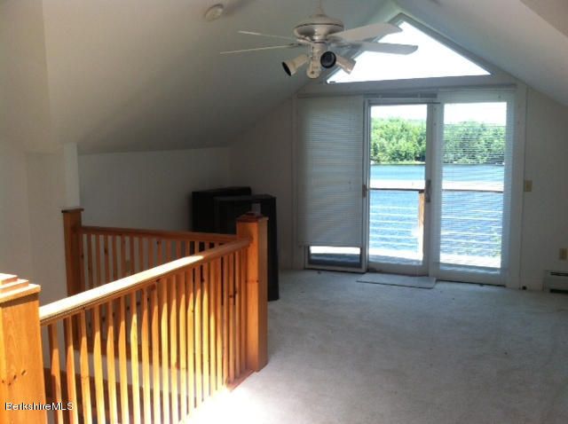 84 Windsor Pond Road Windsor, MA 01270 - Photo 24 of 46 a view of a hallway with windows