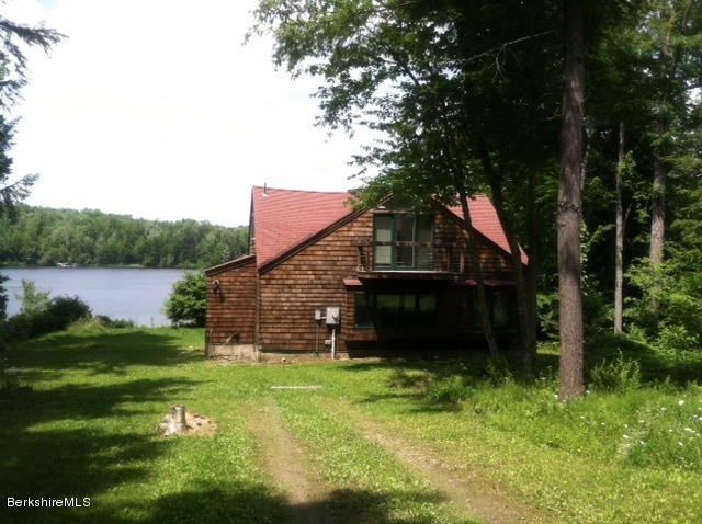 84 Windsor Pond Road Windsor, MA 01270 - Photo 40 of 46 a view of a house with a yard