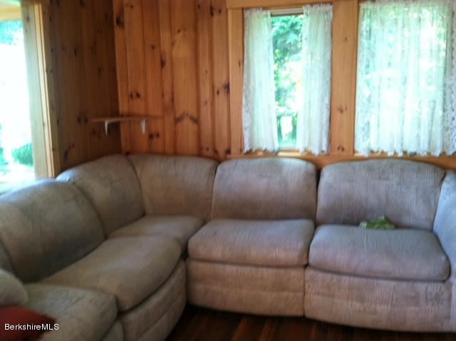 84 Windsor Pond Road Windsor, MA 01270 - Photo 8 of 46 a living room with furniture and a window