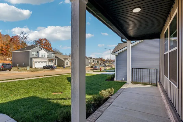 a view of a porch with a yard