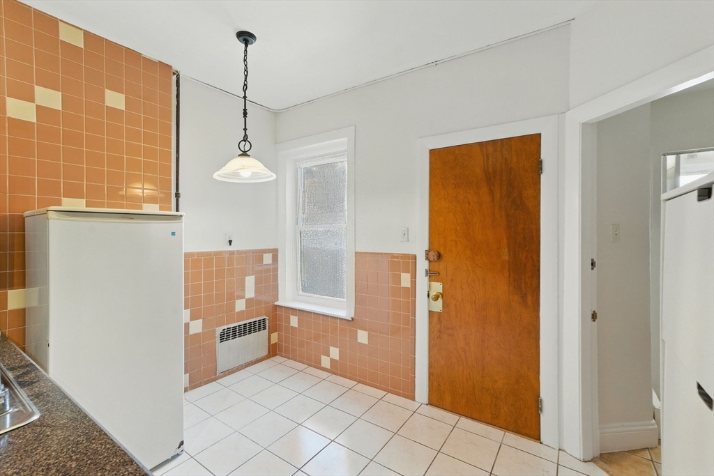 17 Strathmore Road, Unit 2 Brookline, MA 02445 - Photo 10 of 32 a view interior of the house and window
