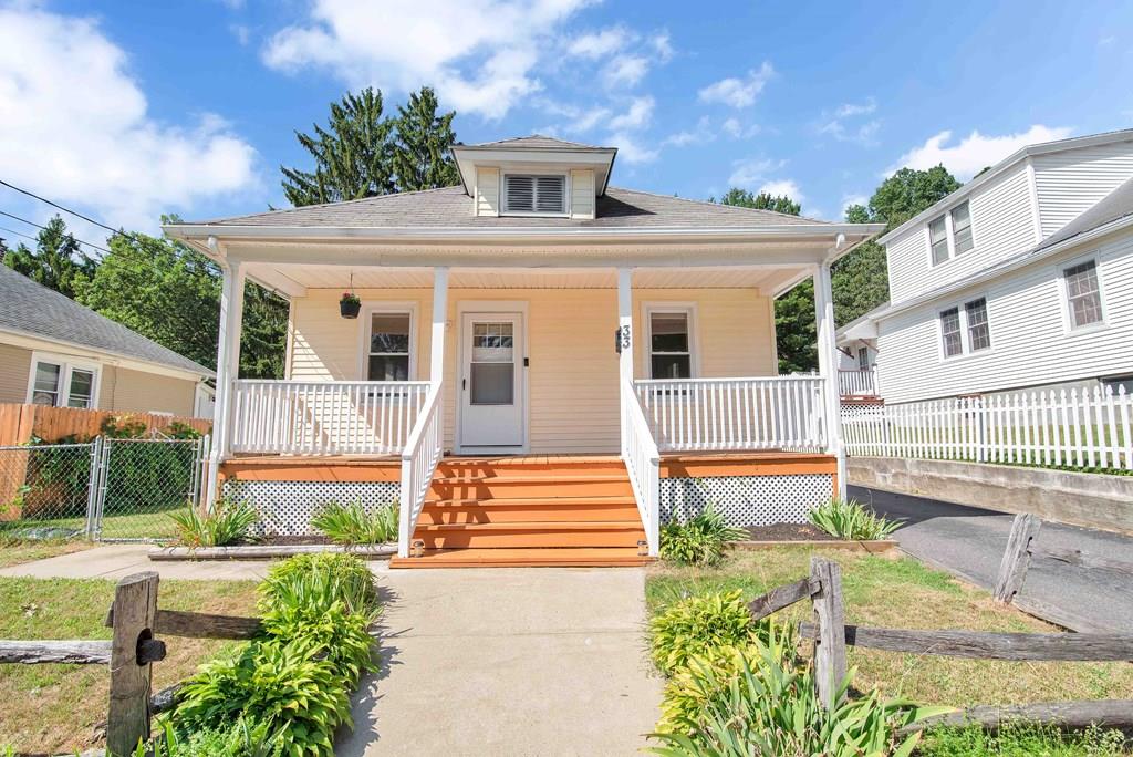 33 Goodwin Street Springfield, MA 01151 - Photo 1 of 27 front view of a house with a yard