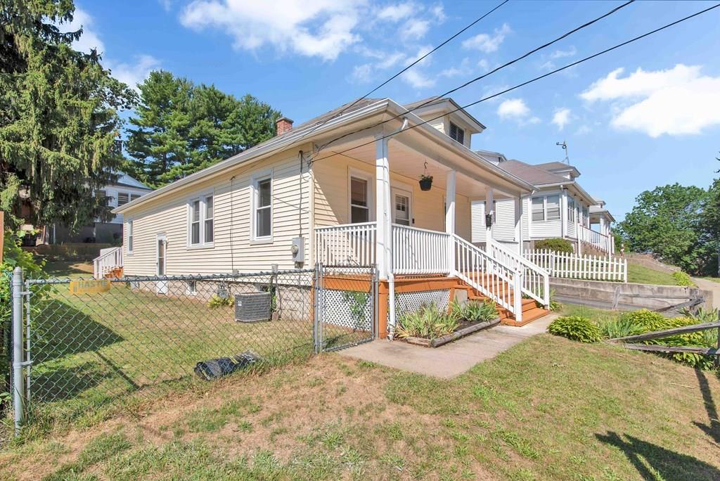33 Goodwin Street Springfield, MA 01151 - Photo 20 of 27 a view of a house with a yard