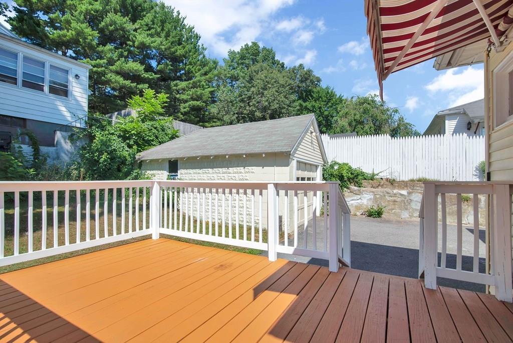 33 Goodwin Street Springfield, MA 01151 - Photo 25 of 27 a view of a house with wooden deck