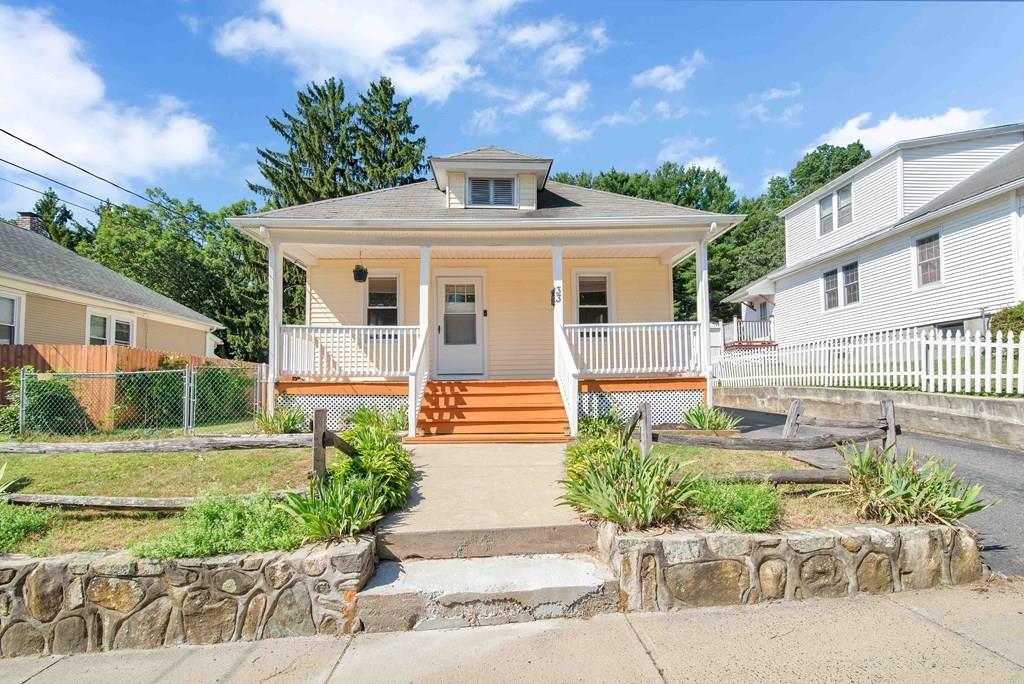 33 Goodwin Street Springfield, MA 01151 - Photo 27 of 27 a front view of a house with a yard