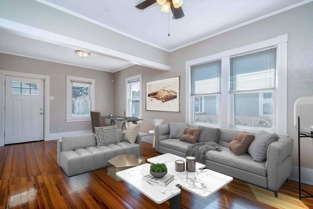 33 Goodwin Street Springfield, MA 01151 - Photo 3 of 27 a living room with furniture and a window
