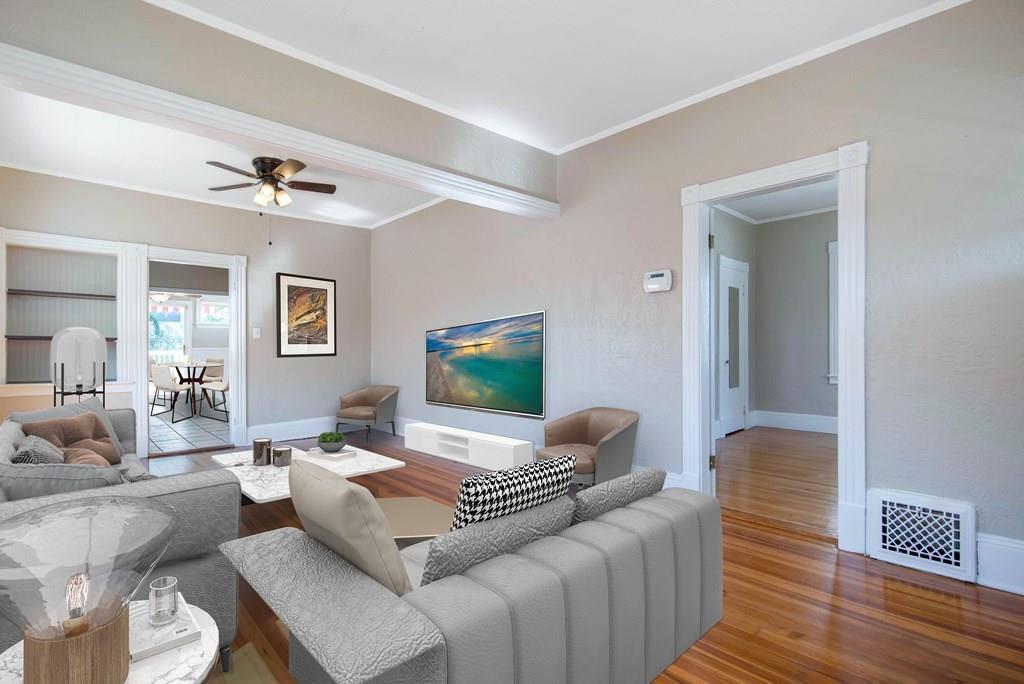 33 Goodwin Street Springfield, MA 01151 - Photo 4 of 27 a living room with furniture and a lamp