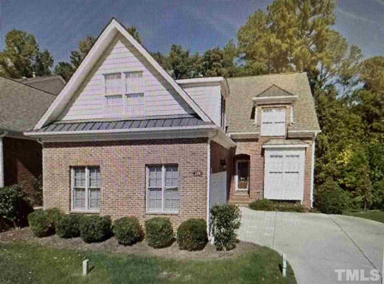 7370 Fontana Ridge Lane Raleigh, NC 27613 - Photo 1 of 27 a front view of a house with a yard