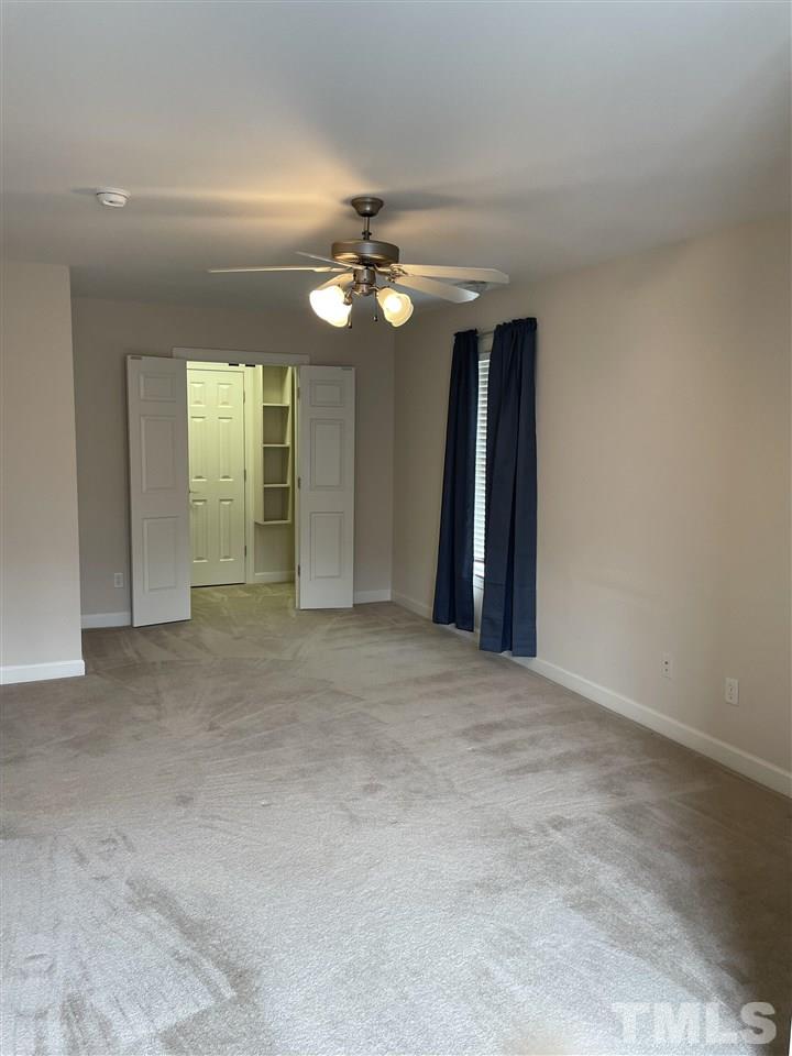 7370 Fontana Ridge Lane Raleigh, NC 27613 - Photo 18 of 27 a view of an empty room with a bathroom