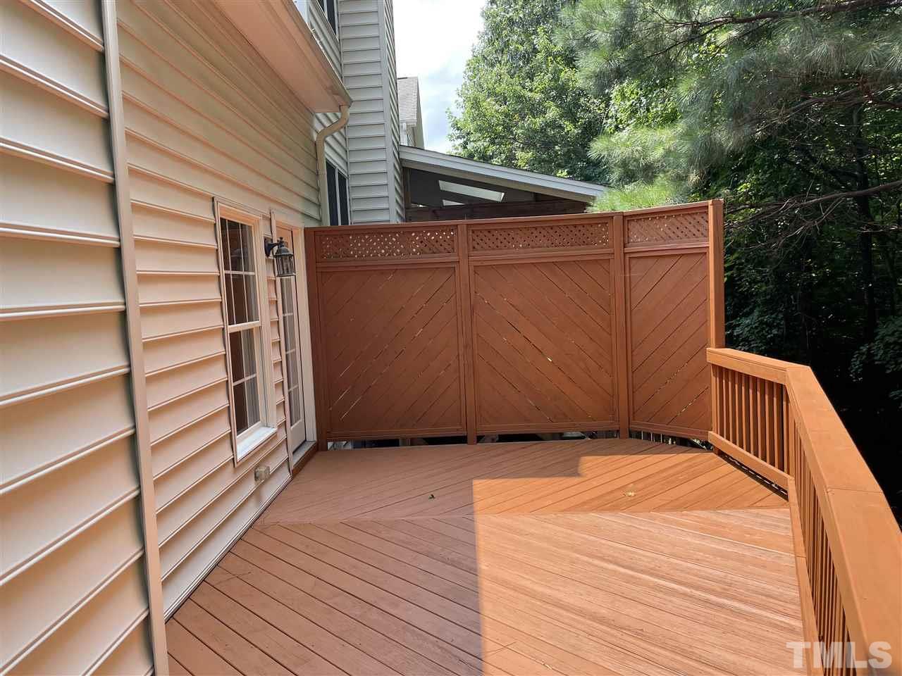 7370 Fontana Ridge Lane Raleigh, NC 27613 - Photo 22 of 27 a view of a backyard of the house