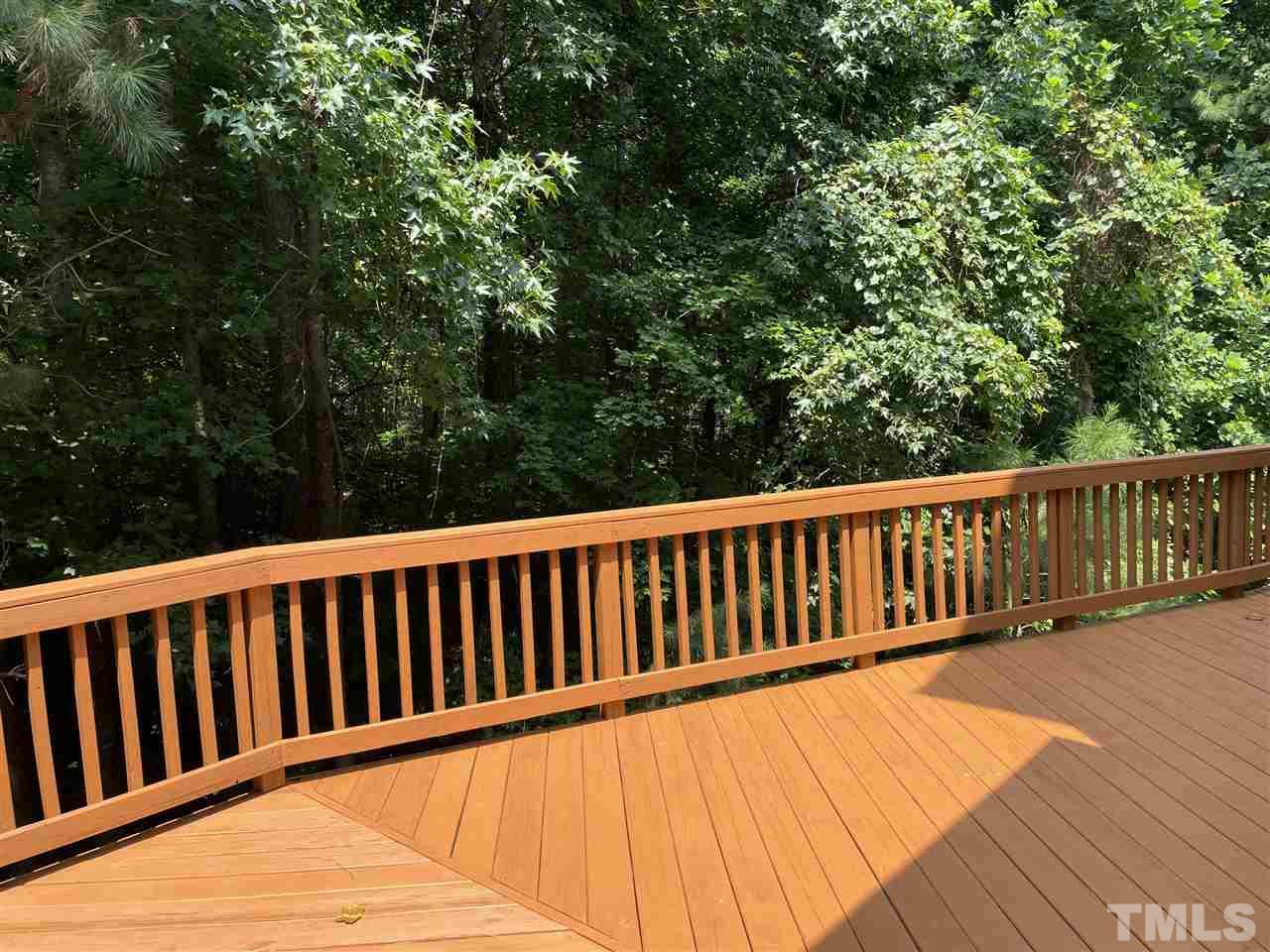 7370 Fontana Ridge Lane Raleigh, NC 27613 - Photo 23 of 27 a view of balcony with wooden floor