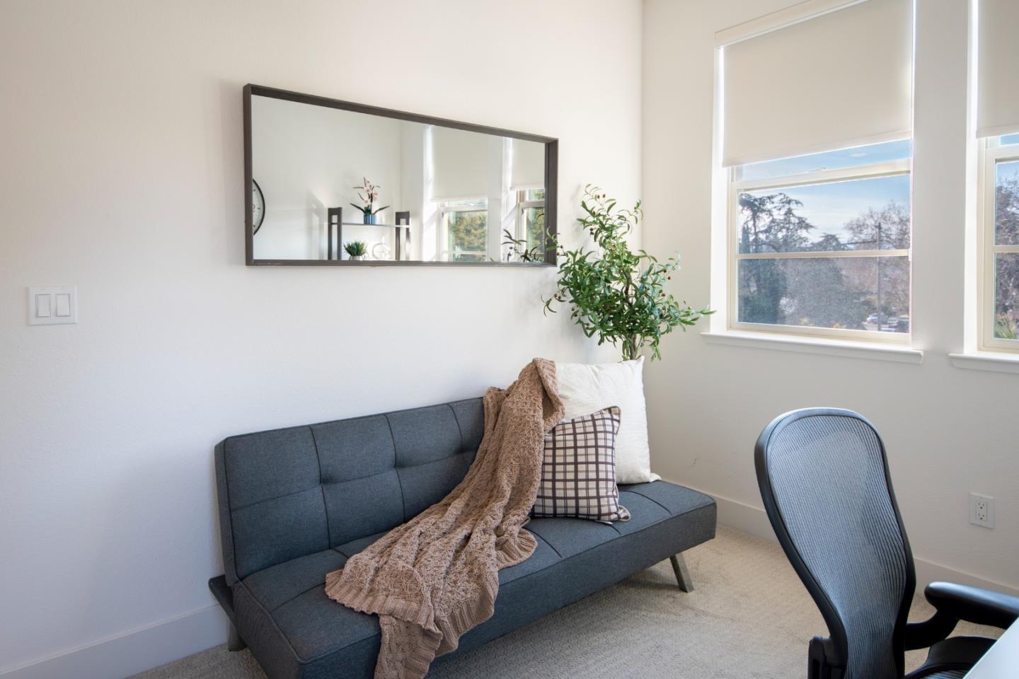1291 Verano Road Mountain View, CA 94043 - Photo 20 of 49 a living room with furniture and a potted plant