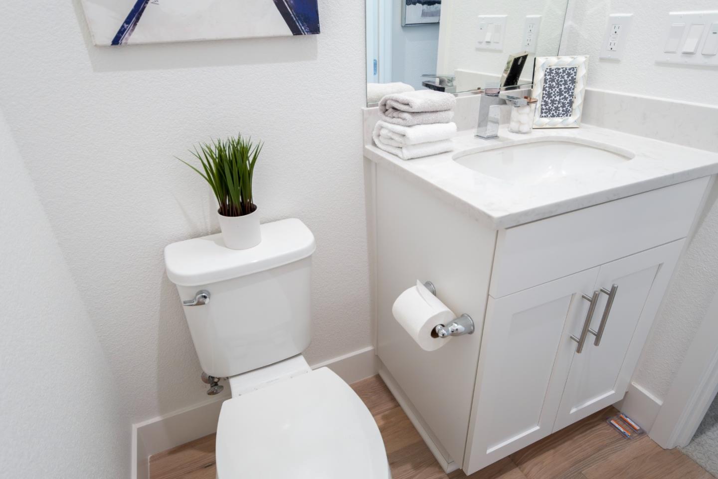 1291 Verano Road Mountain View, CA 94043 - Photo 30 of 49 a bathroom with a toilet sink and mirror
