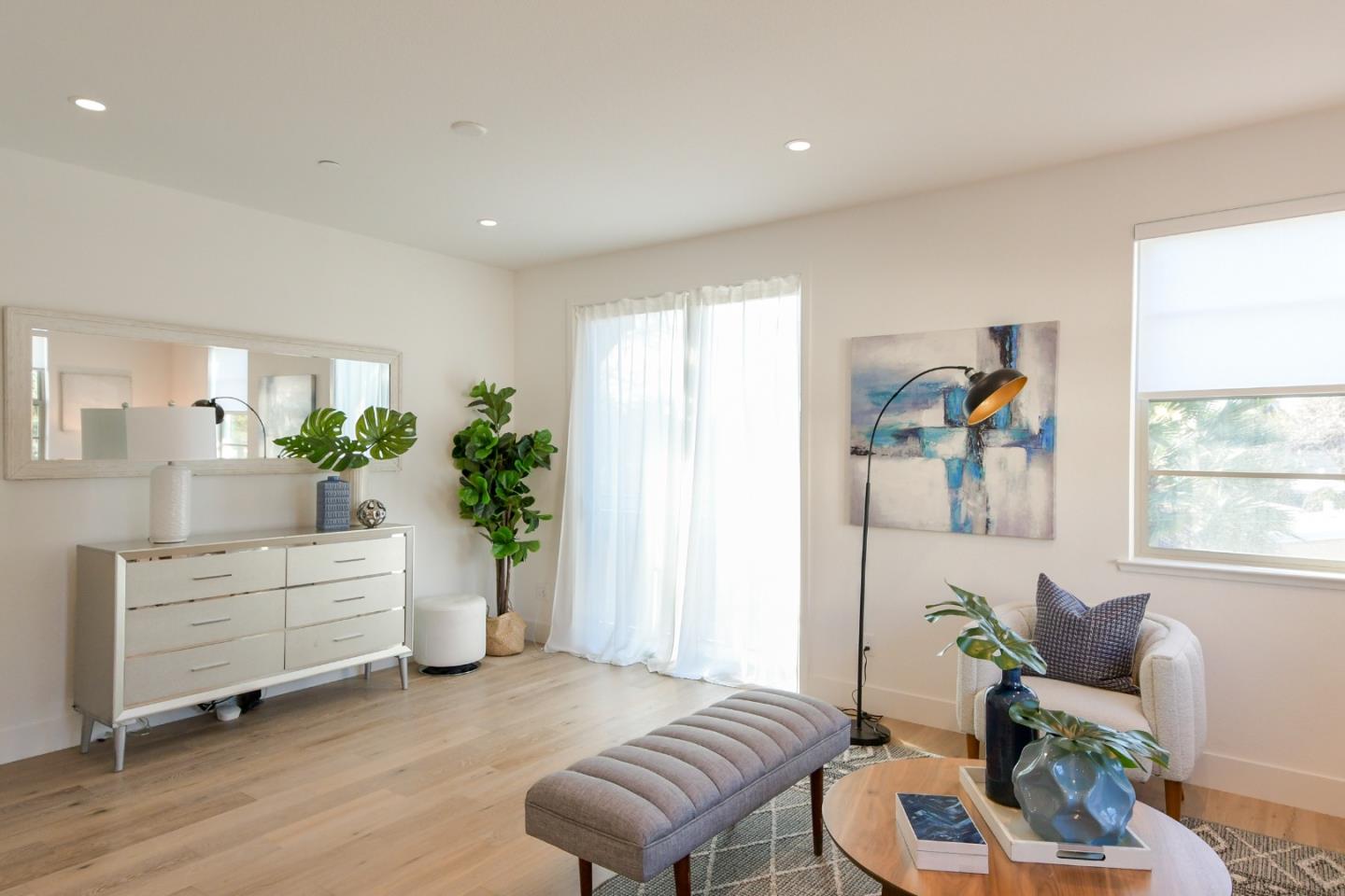 1291 Verano Road Mountain View, CA 94043 - Photo 7 of 49 a living room with furniture and a potted plant