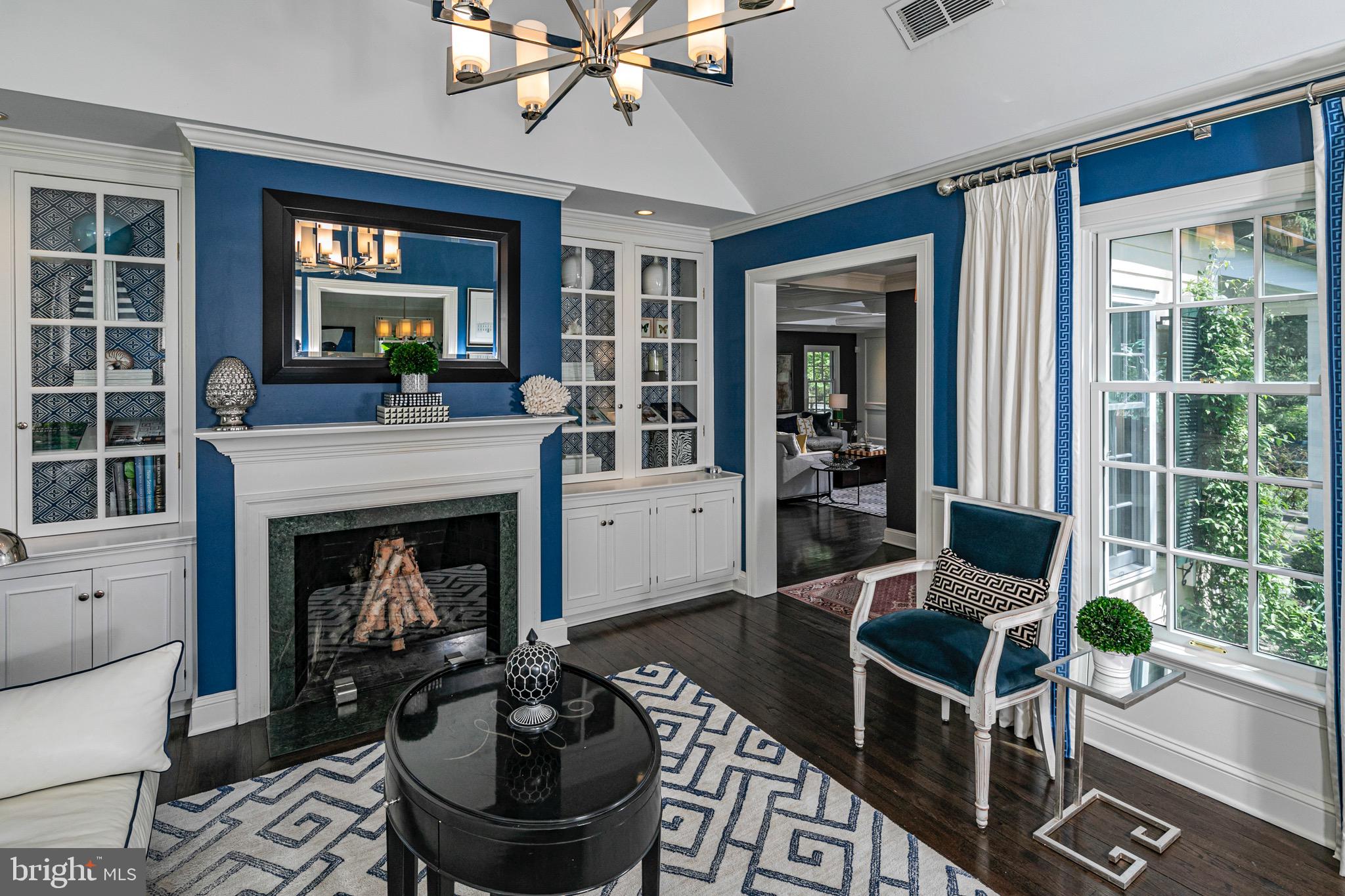 4445 Province Line Road Princeton, NJ 08540 - Photo 12 of 45 a living room with furniture a window and a fireplace