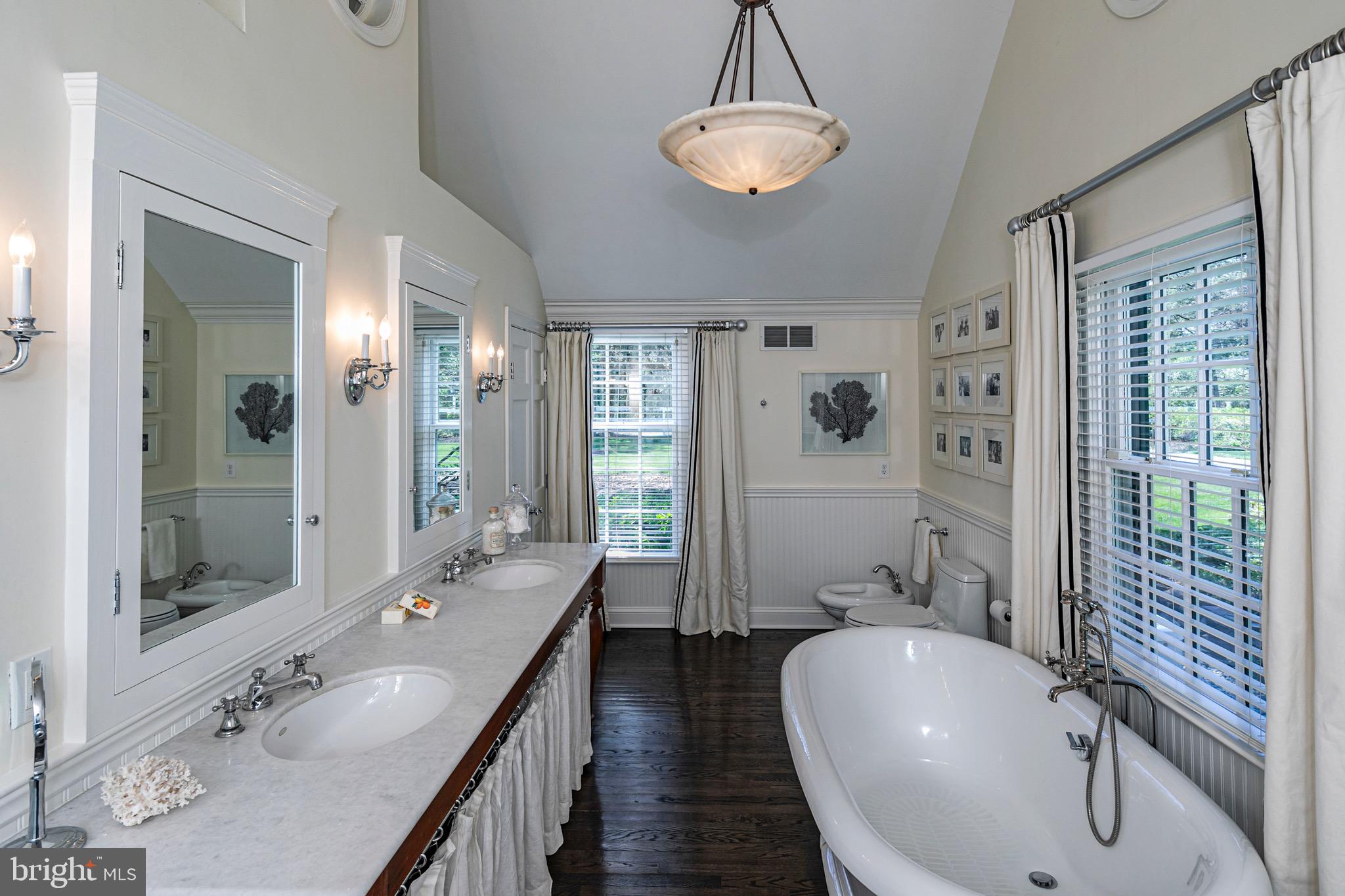 4445 Province Line Road Princeton, NJ 08540 - Photo 18 of 45 a bathroom with double vanity and a bathtub