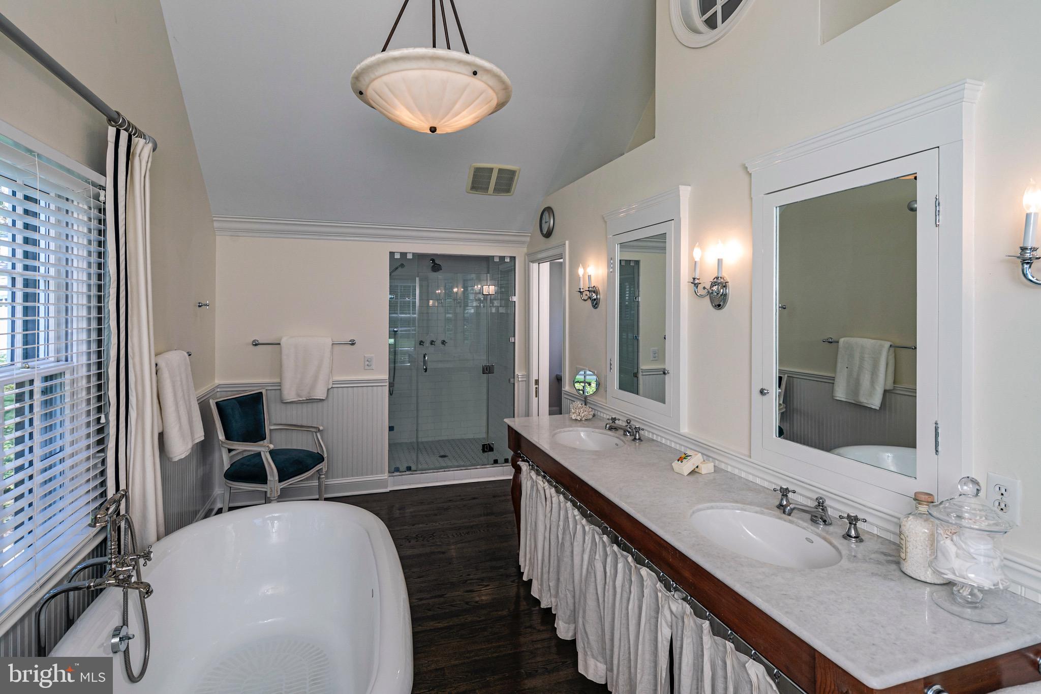 4445 Province Line Road Princeton, NJ 08540 - Photo 19 of 45 a spacious bathroom with a double vanity sink a mirror and a shower