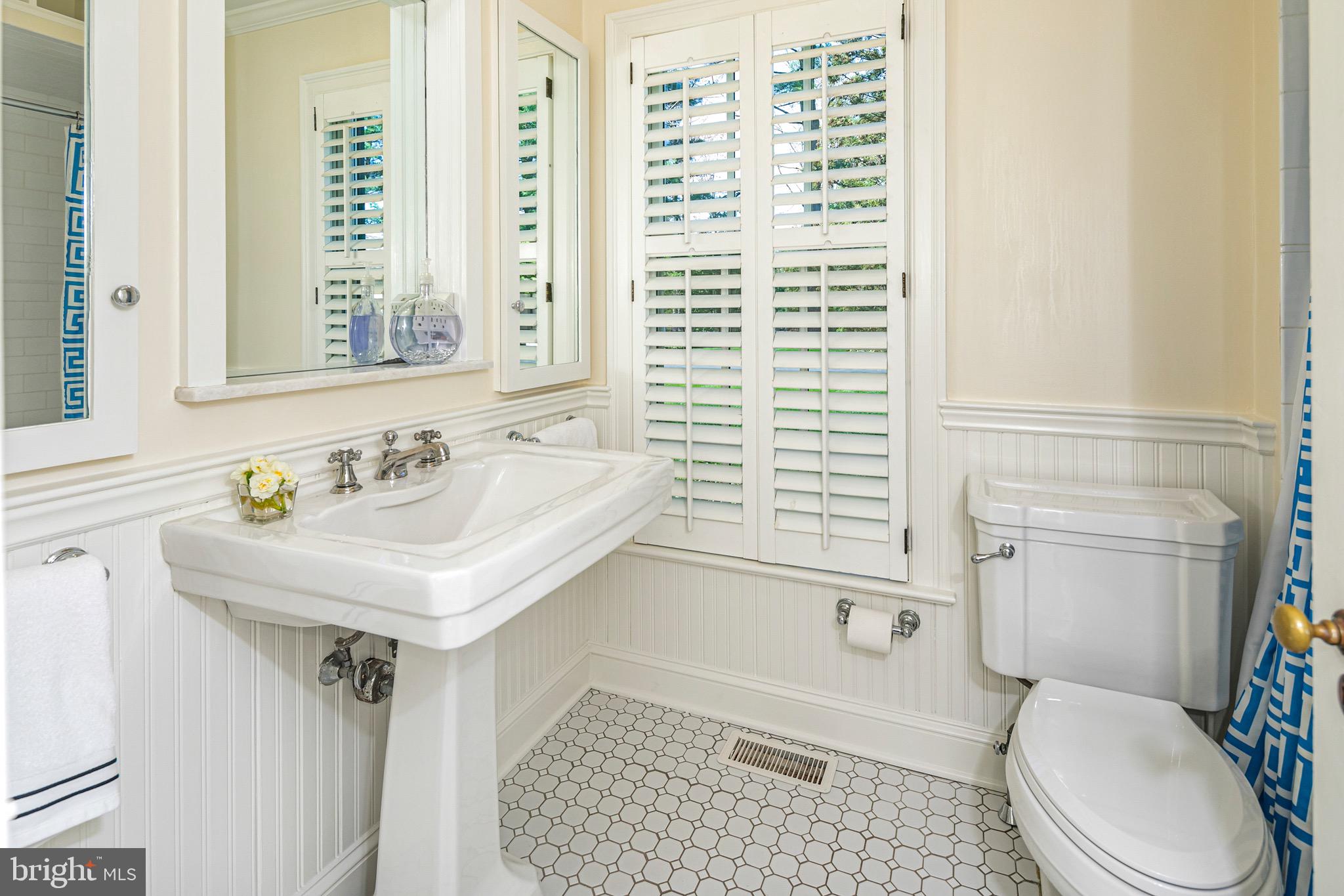 4445 Province Line Road Princeton, NJ 08540 - Photo 22 of 45 a bathroom with a sink a toilet and shower