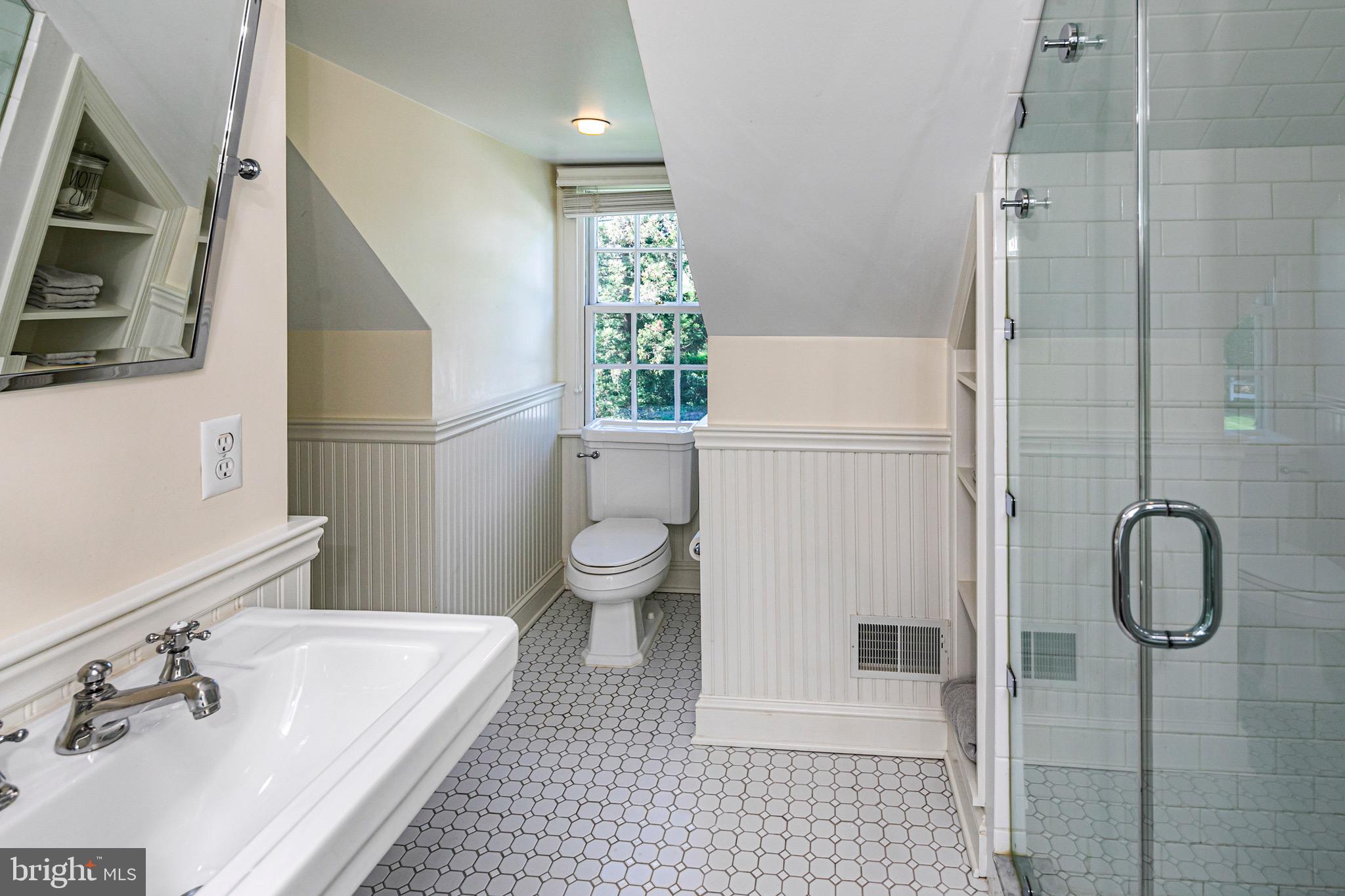 4445 Province Line Road Princeton, NJ 08540 - Photo 24 of 45 a bathroom with a sink toilet and shower