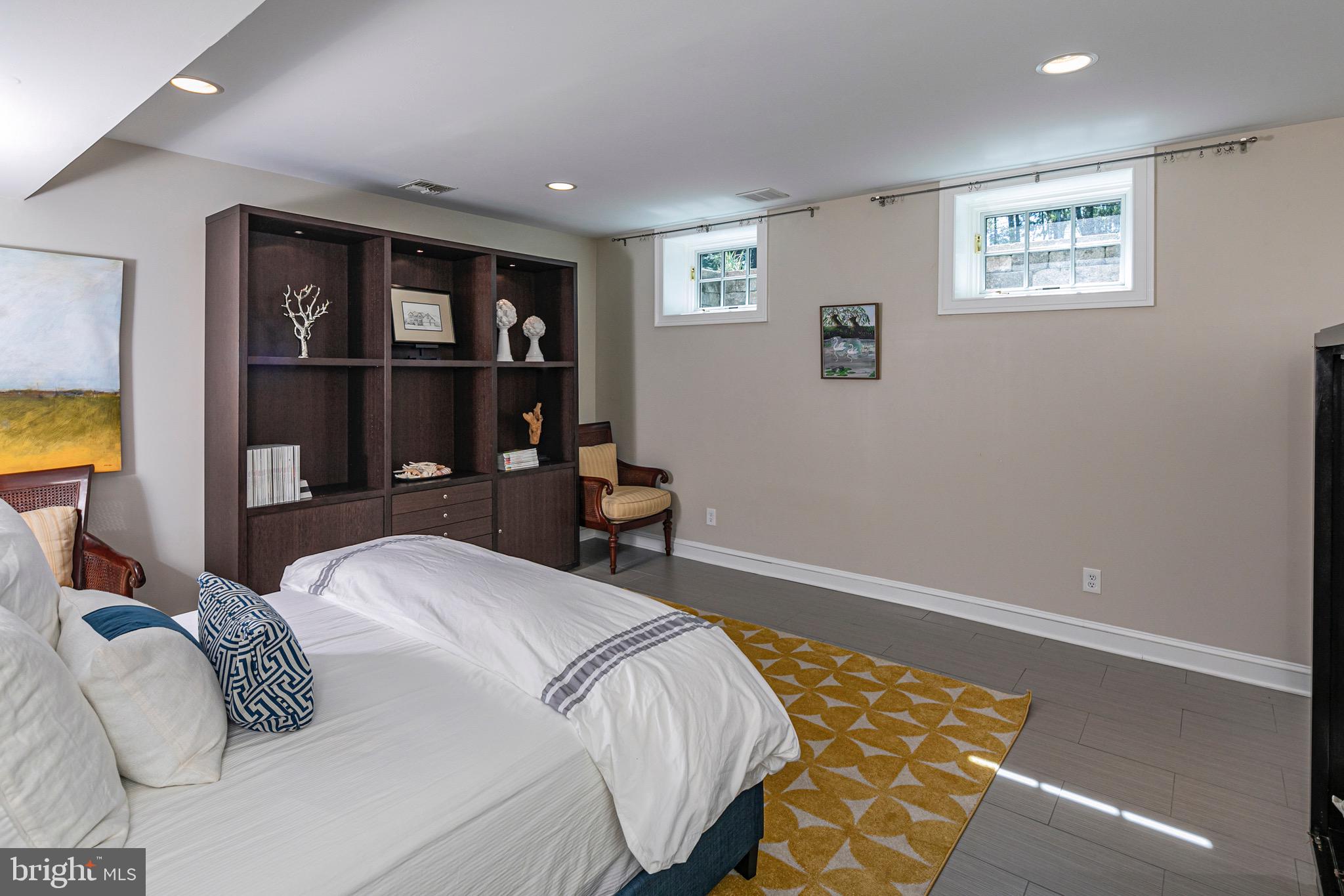 4445 Province Line Road Princeton, NJ 08540 - Photo 29 of 45 a bedroom with a bed and wooden floor