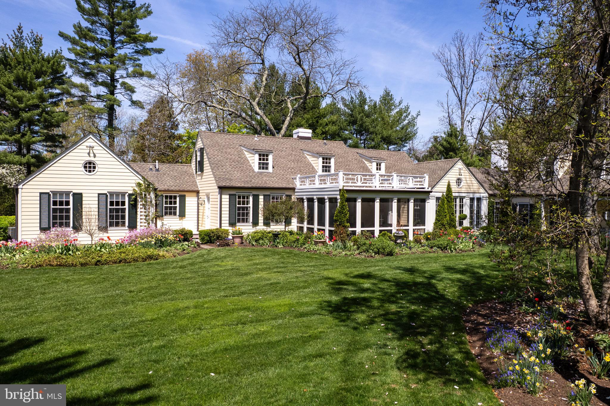 4445 Province Line Road Princeton, NJ 08540 - Photo 33 of 45 a front view of a house with a garden