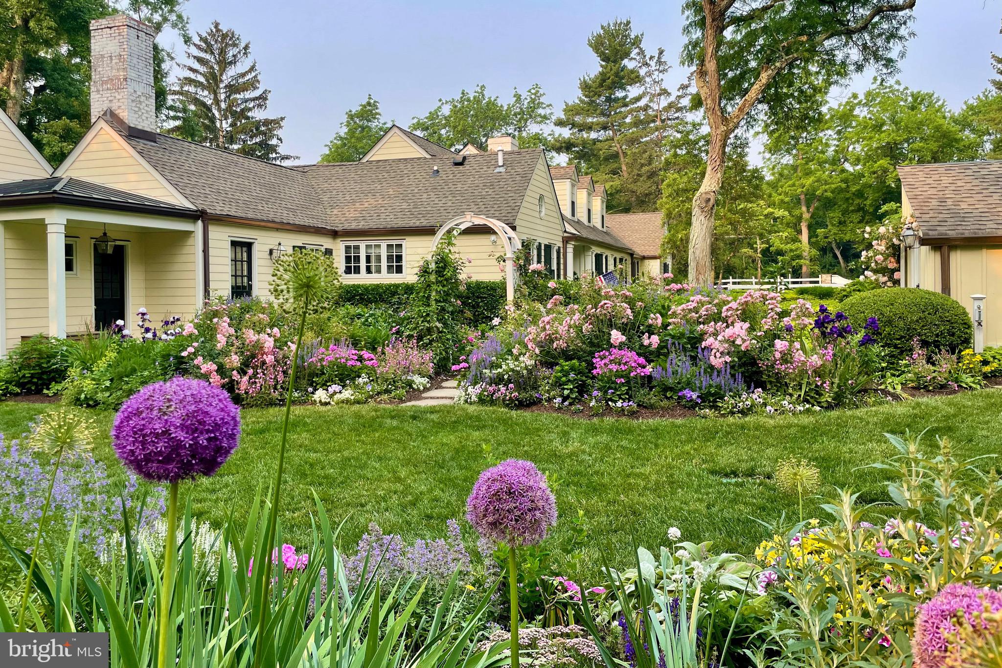 4445 Province Line Road Princeton, NJ 08540 - Photo 43 of 45 a front view of a house with a yard and fountain