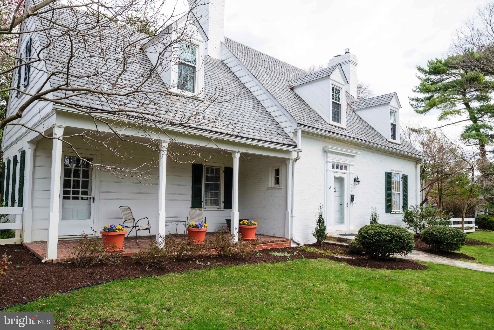 208 Taplow Road Baltimore, MD 21212 - Photo 1 of 30 a front view of a house with a yard and outdoor seating