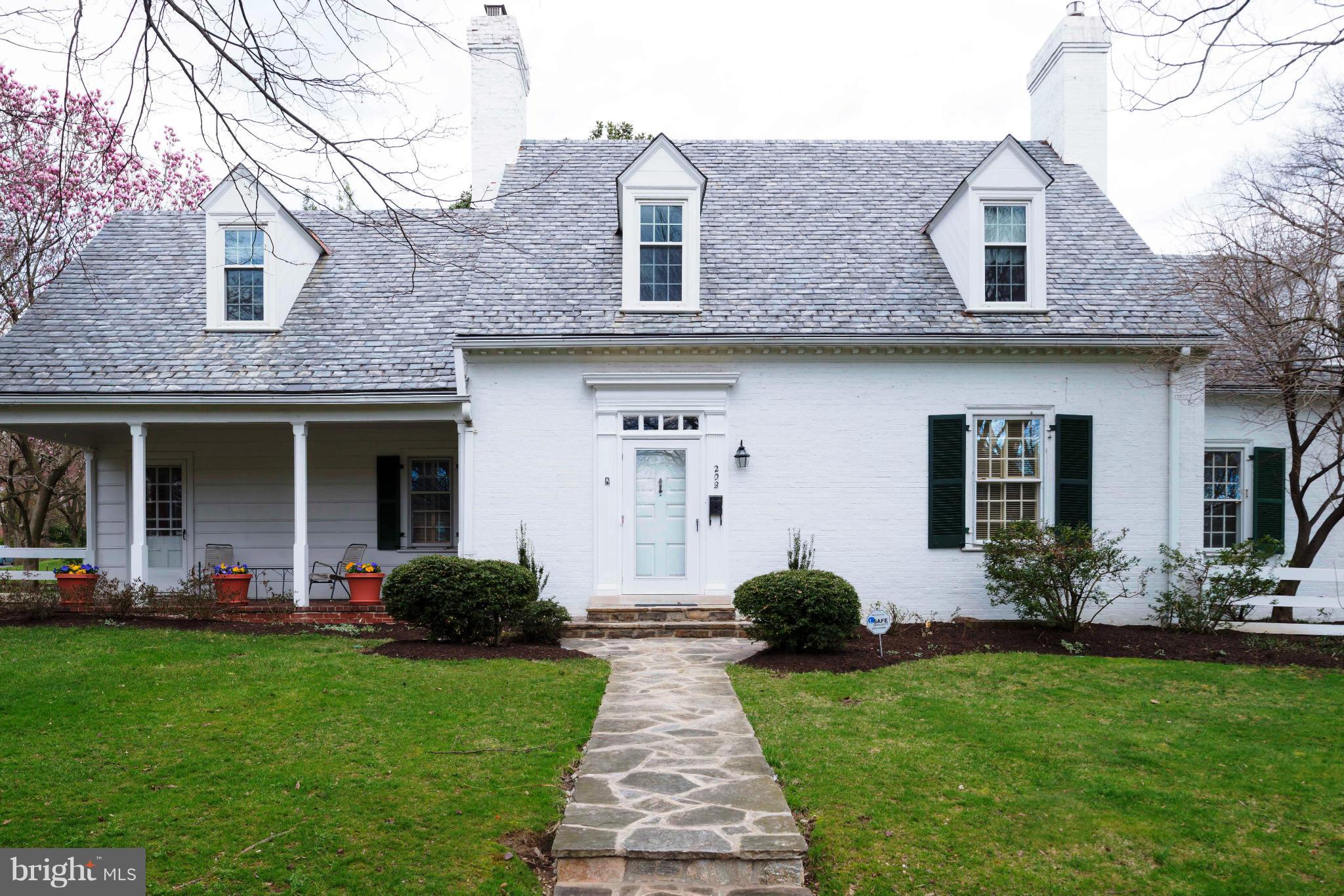 208 Taplow Road Baltimore, MD 21212 - Photo 2 of 30 a front view of a house with garden