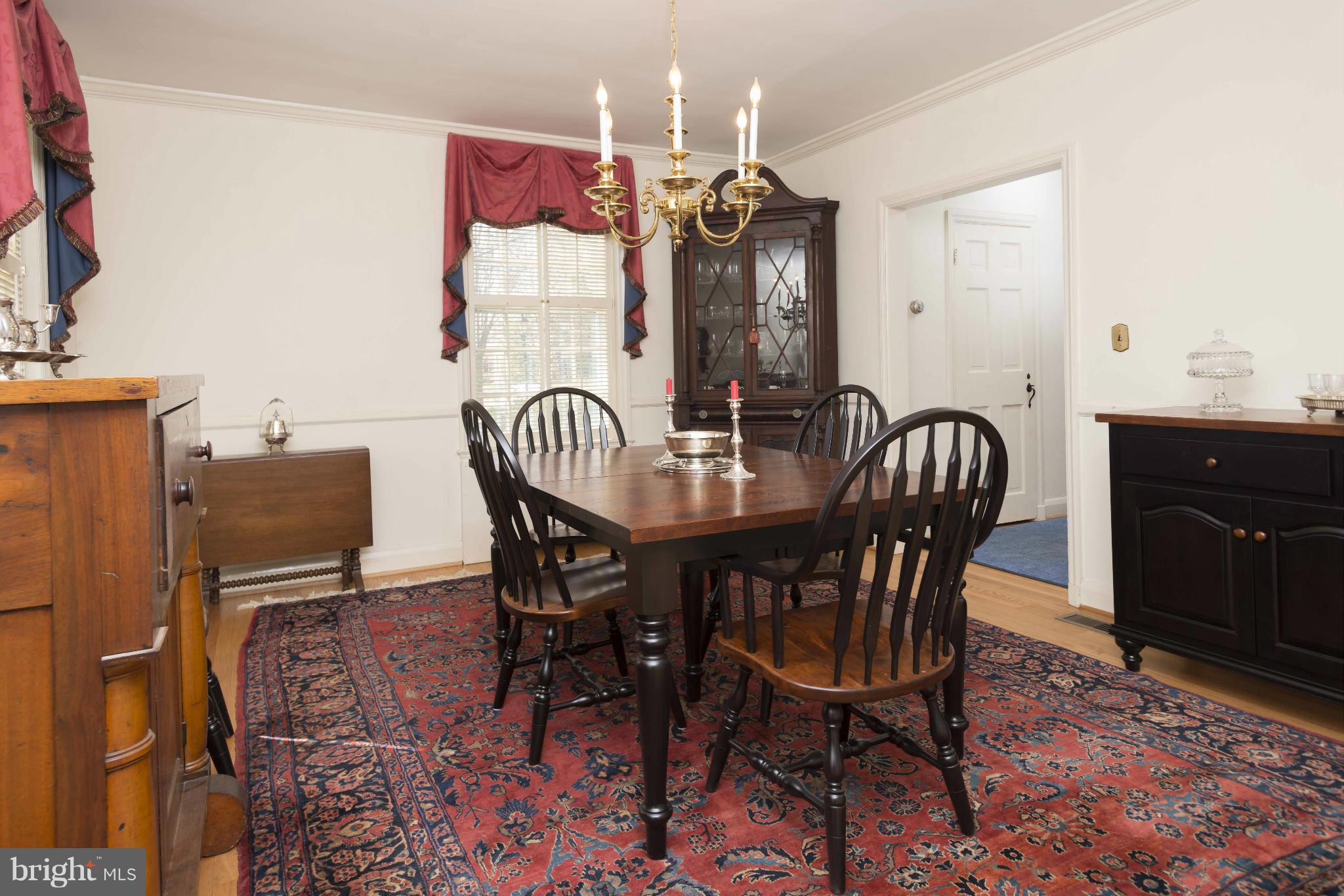 208 Taplow Road Baltimore, MD 21212 - Photo 11 of 30 a view of a dining room with furniture