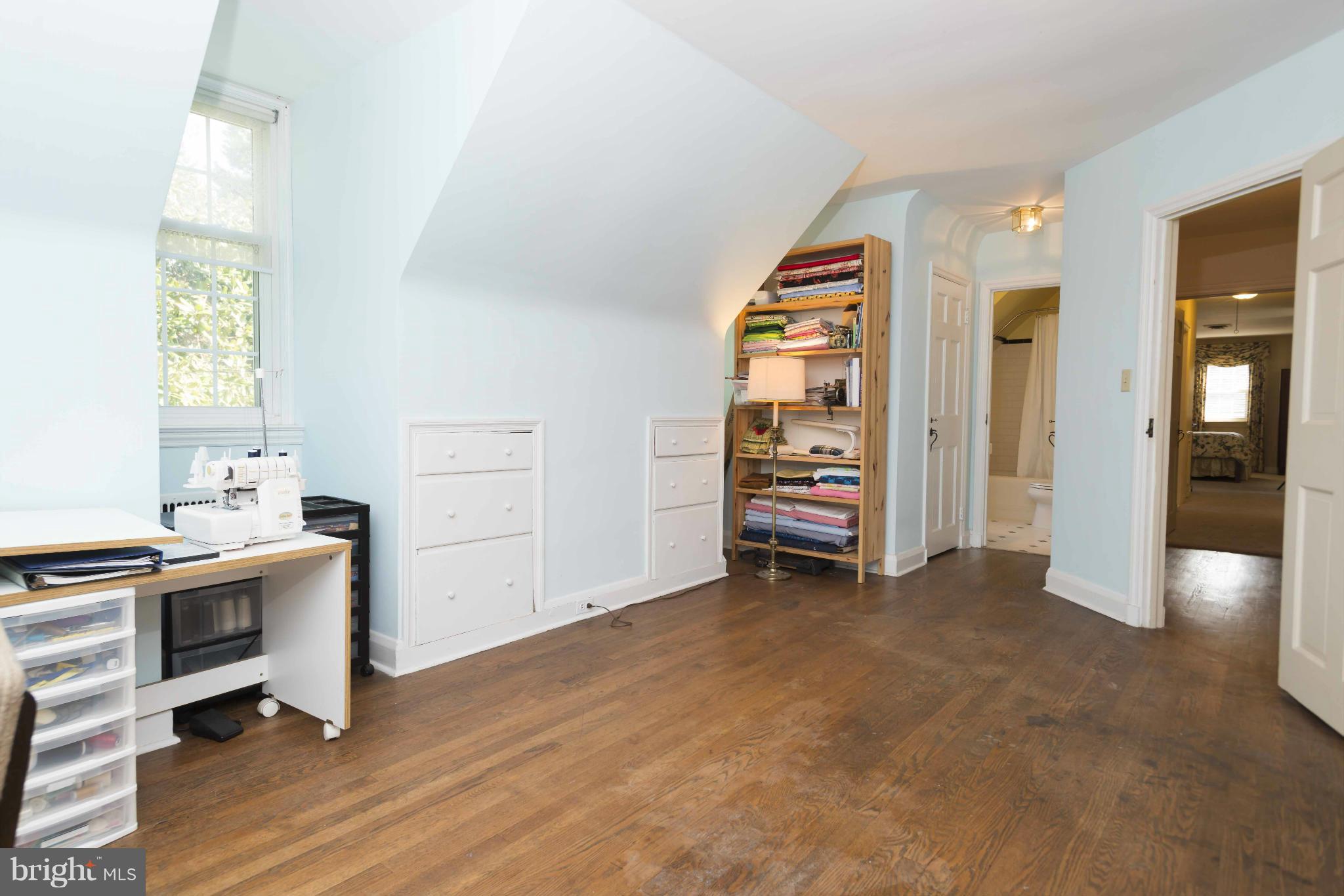 208 Taplow Road Baltimore, MD 21212 - Photo 15 of 30 wooden floor and windows in a room