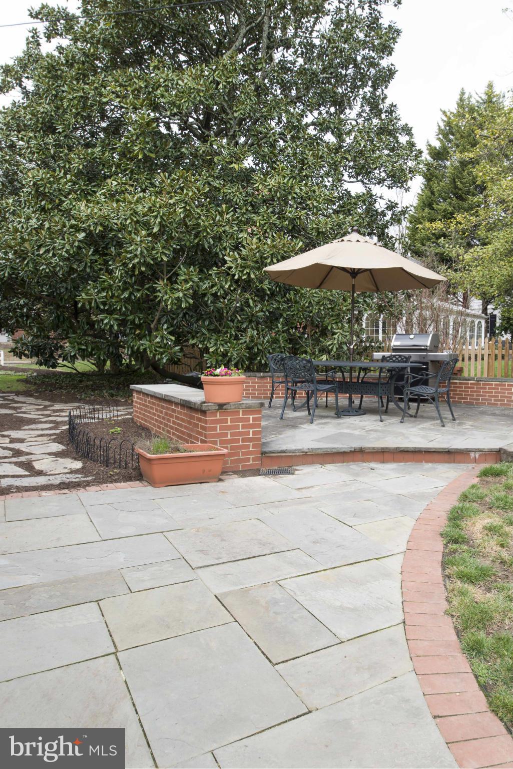 208 Taplow Road Baltimore, MD 21212 - Photo 26 of 30 a backyard of a house with yard and outdoor seating