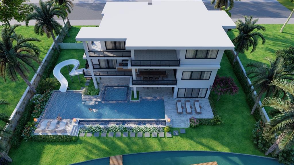 5179 Hidden Harbor Road Sarasota, FL 34242 - Photo 5 of 9 a view of a house with a yard