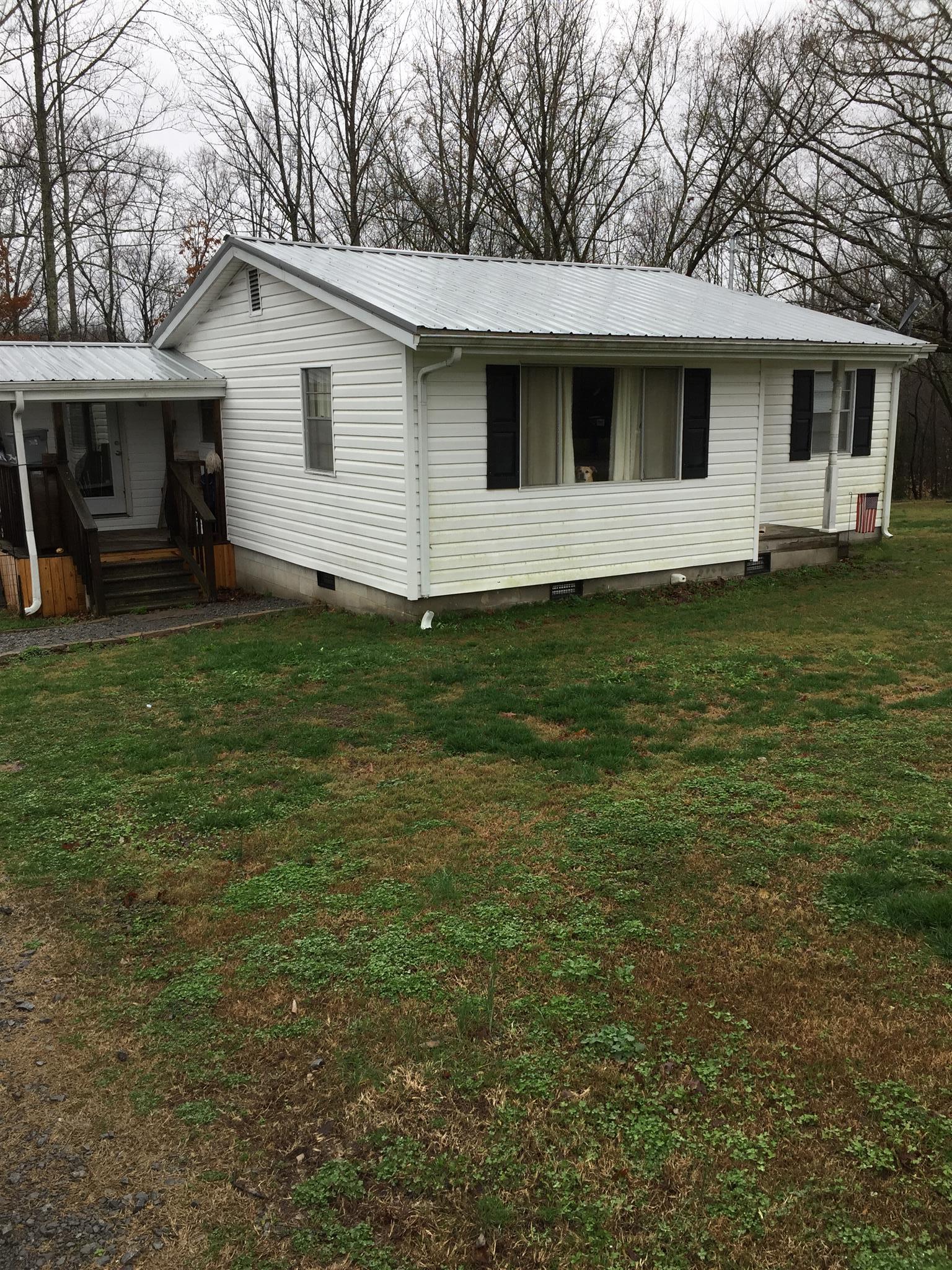 1059 Throneberry Road Normandy, TN 37360 - Photo 2 of 6 Cottage style home containing 2 bedroom, 2 bathrooms, and sits on 3 ac+/-