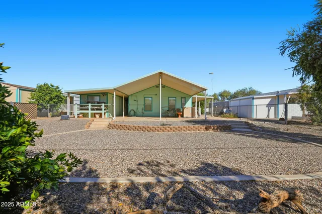 swimming pool view with a seating space