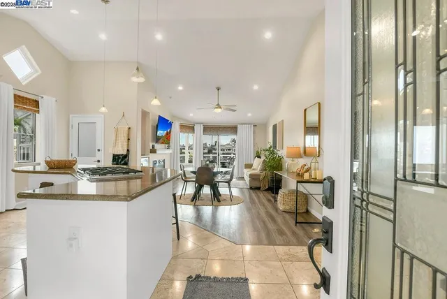 a view of a living room and dining room