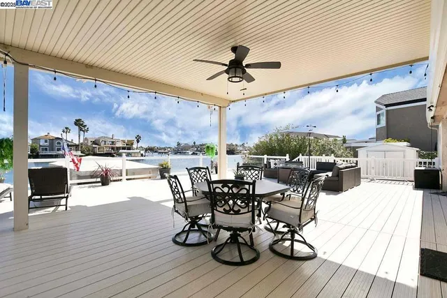 a view of a dining room and hall with wooden floor