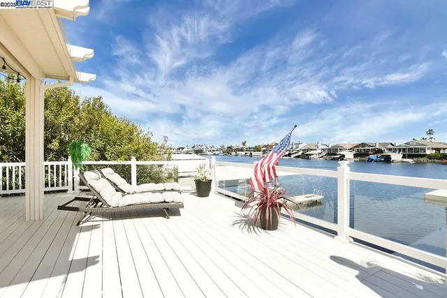 a view of roof deck with patio