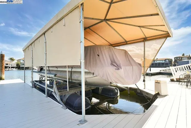 a view of a balcony with chairs