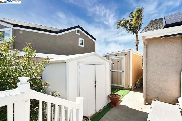 a view of a house with a potted plant
