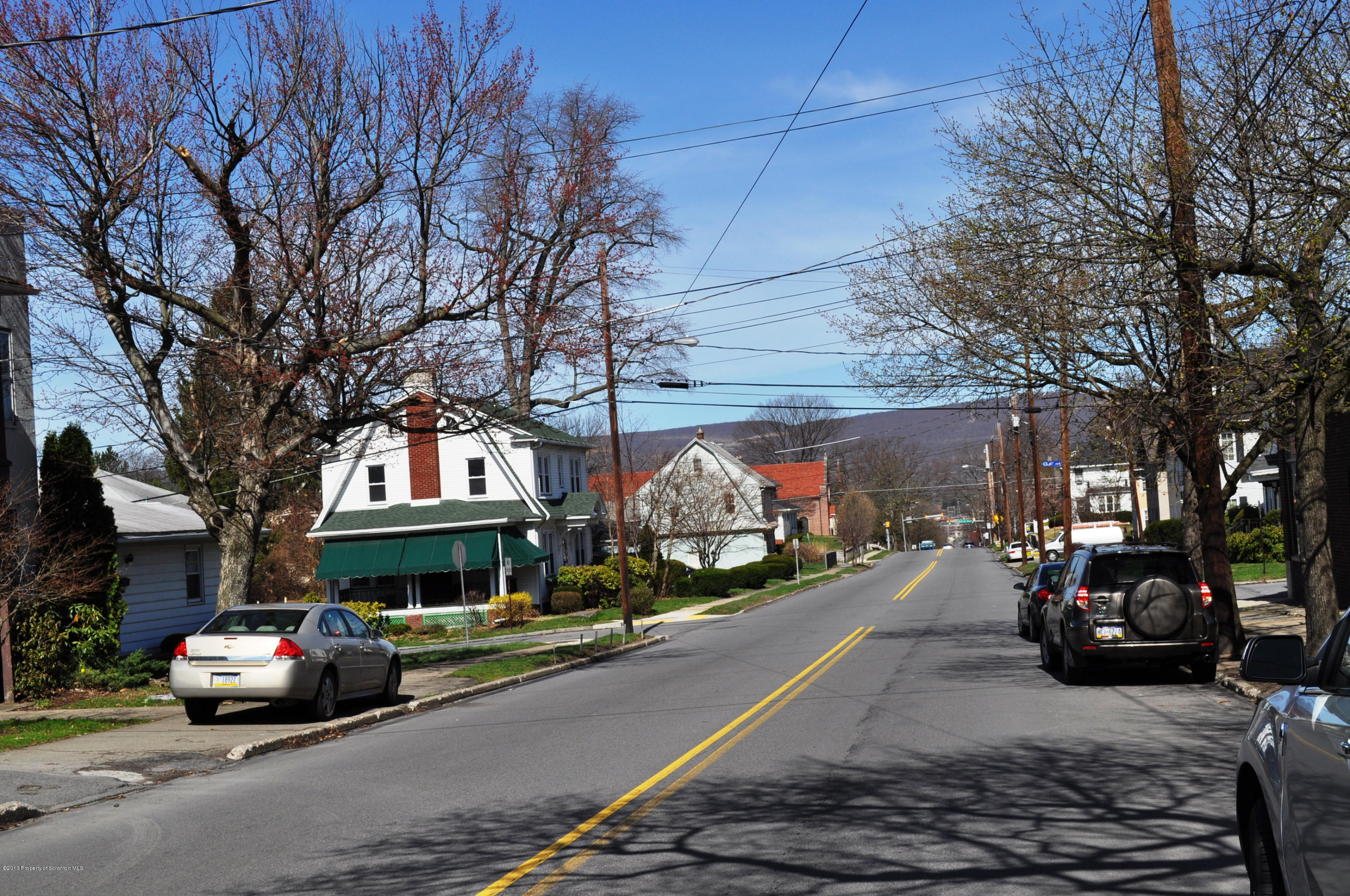 1817 Green Ridge Street Dunmore, PA 18509 - Photo 19 of 21 a view of a cars parked on the side of a street