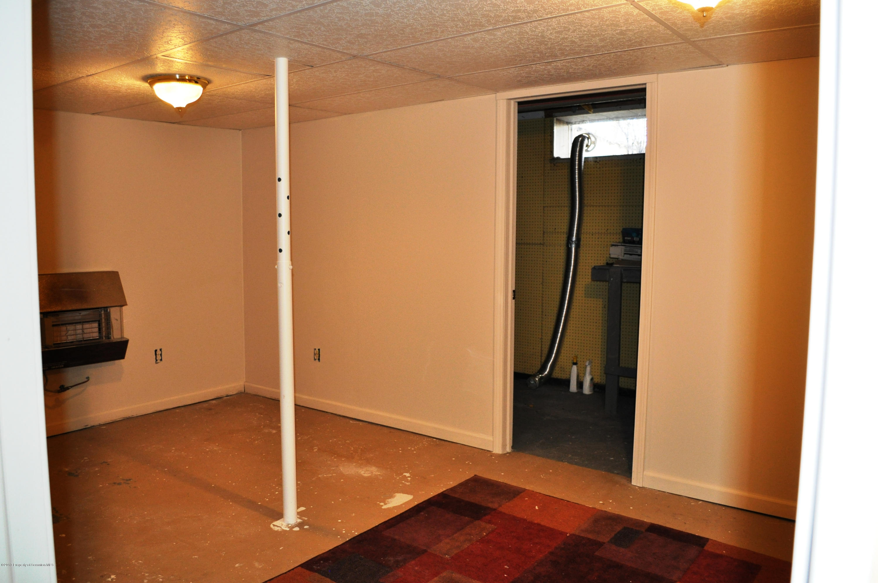 1817 Green Ridge Street Dunmore, PA 18509 - Photo 10 of 21 a view of a hallway with wooden floor