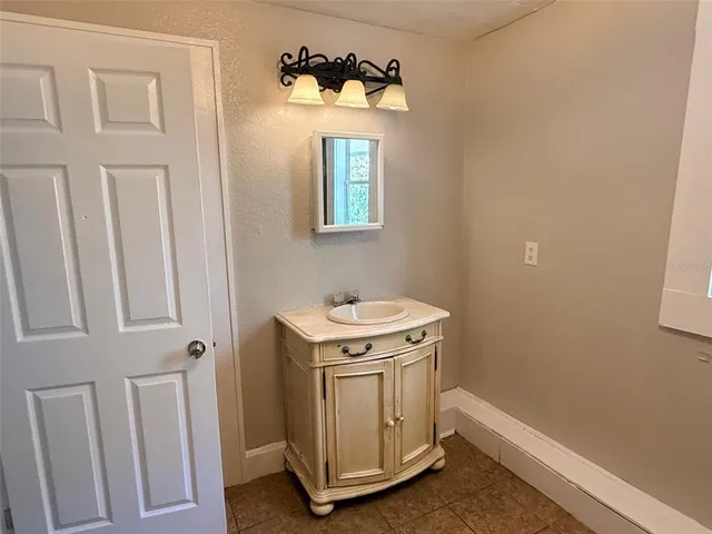 a utility room with a window dryer and washer