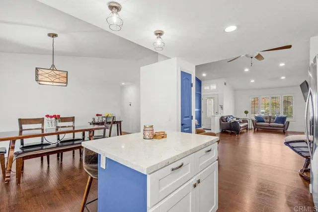 a view of a kitchen and dining room